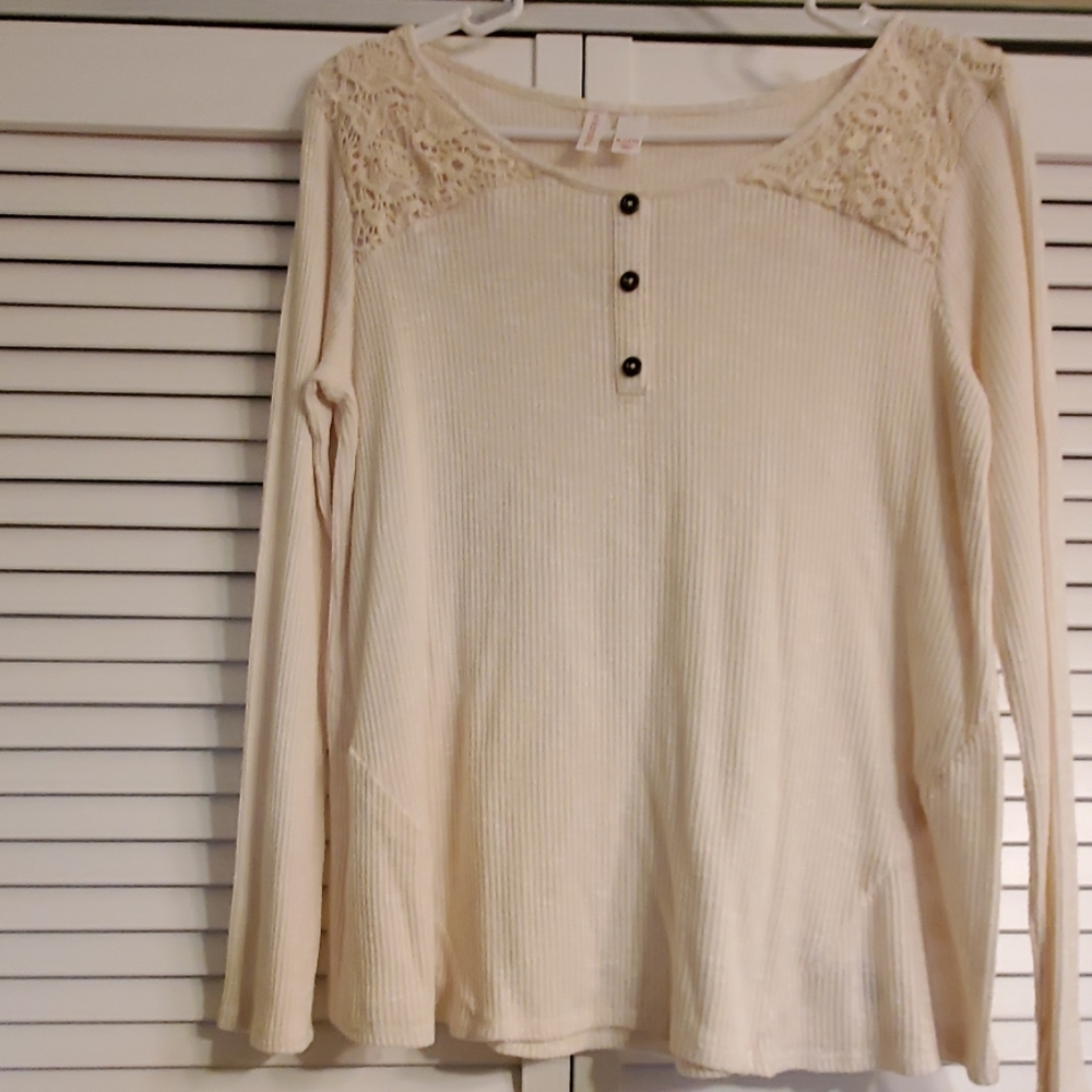 Ivory long sleeve with lacy top.